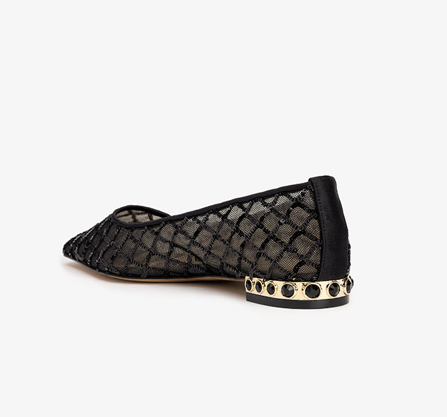 “Handmade designer flats by Nalebe”
